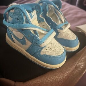 Nike Jordan 1 Toddler Light Blue and White High-Top Sneakers